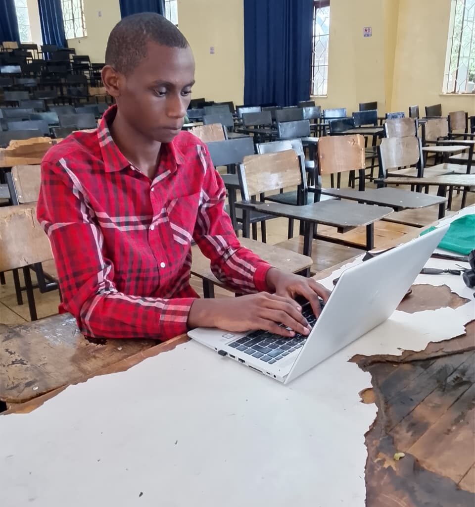 Moses Always Working On His Computer