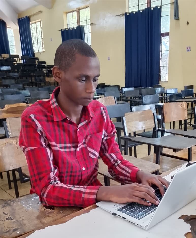 Moses Always Working On His Computer