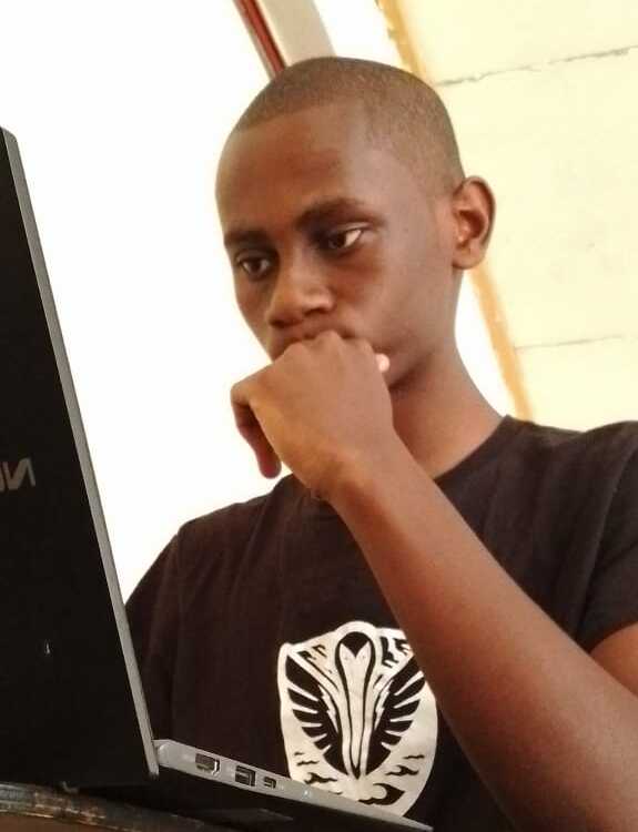 Moses Workking On A Laptop