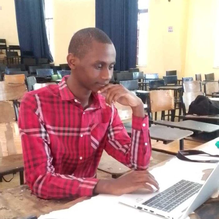 Moses looking at a Computer