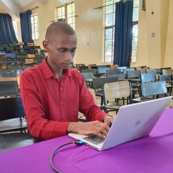 Moses Working On A Laptop
